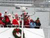 Santa, Mrs. Claus and the elves arrive by Boat in Boothbay Harbor. GARY DOW/Boothbay Register
