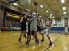 Sarah Caron puts up a left-handed layup against tough defensive pressure. RYAN LEIGHTON/Boothbay Register