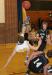Nick Kilgus gets his feet taken out during a drive to the basket. KEVIN BURNHAM/Boothbay Register