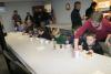 Digging into the ice cream and cake before the ceremony. KEVIN BURNHAM/Boothbay Register