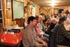 Tyler Tibbetts and Farrin among the crowd listening to the business meeting. SUE MELLO/Boothbay Register