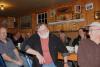 Former President Dennis Blackman was "honored" with a tipped over boat off the cake to commemorate his falling overboard while fishing. SUE MELLO/Boothbay Register