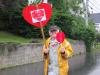 Tom Hagan marches with hearts. SUE MELLO/Boothbay Register