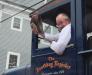 Boothbay Register's nostalgic float, with Joe Gelarden at wheel. SUE MELLO/Boothbay Register