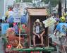 Quinn Pickett is indisposed at the back of this Maine-themed float.  SUE MELLO/Boothbay Register