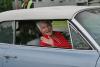 Sally Bullard, Street Parade Grand Marshal, waves to the spectators. KEVIN BURNHAM/Boothbay Register