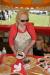 Dawn Gilbert slices the homemade pies. KEVIN BURNHAM/Boothbay Register
