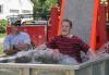 Firefighter and Dunk Tank operator Dave McFarland is amused with the reaction by another "customer" going in the tank. KEVIN BURNHAM/Boothbay Register