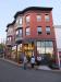 A small gathering outside of Janson's Clothing as the September sun dips behind the buildings. RYAN LEIGHTON/Boothbay Register