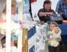 This young fairgoer was thrilled with her new baby doll. SUE MELLO/Boothbay Register
