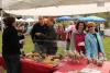 While customers sample fudge, Kate and Sue Norton pose for the camera. SUE MELLO/Boothbay Register
