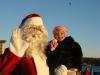 Santa waving with Natalie Dunbar in Wiscasset