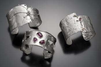 Three cuffs by jewelry maker Christine Peters Hamilton of Boothbay.