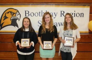 Girls soccer plaque winners, from left, Evy Greenleaf, Coaches Award; Sinead Miller, Most Valuable; and Lisa Pawlowski, Most Improved. KEVIN BURNHAM/Boothbay Register
