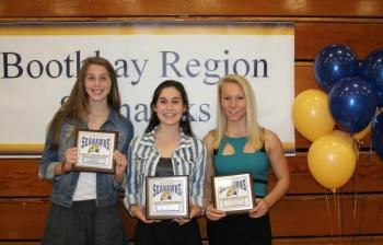 Girls cross-country plaque winners, from left, Kate Friant, Most Improved; Sofia Thayer, Most Valuable; and Morgan Crocker, Coaches Award. KEVIN BURNHAM/Boothbay Register