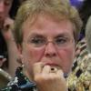 Former St. Andrews CEO Peggy Pinkham listens to a speaker.