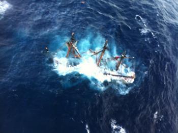 The 'Bounty' sinking into the Atlantic Ocean around 90 miles southeast of Hatteras, NC on October 29. Courtesy of Petty Officer 2nd Class Tim Kuklewski of the U.S. Coast Guard
