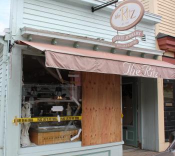 Plywood covers the display window at The Ritz jewelry store after an apparent fight led to its destruction in the wee hours of Sunday morning. SUE MELLO/Boothbay Register